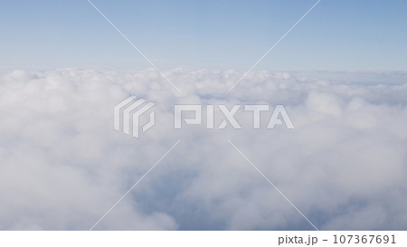 Airplane shot, flying over white clouds over europe Airplane shot, flying over white clouds over europe 107367691