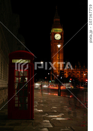 Phone booth and Big Ben in London by night Phone booth and Big Ben in London by night 107367759