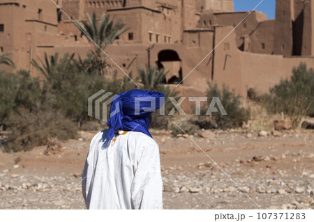 Berber in traditional costume in Ait Benhaddou Berber in traditional costume in Ait Benhaddou 107371283