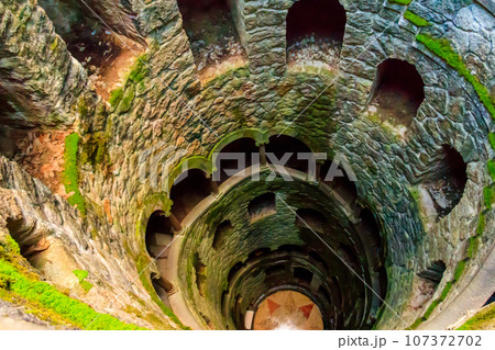 Initiation Well (Inverted tower) at park of Quinta da Regaleira palace in Sintra, Portugal 107372702