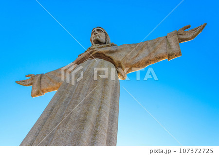 The Sanctuary of Christ the King (Cristo Rei) overlooking the city of Lisbon situated in Almada, in Portugal 107372725