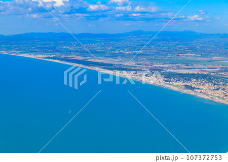 View from a flying plane on Fiumicino bay and the Tyrrhenian sea, Italy 107372753