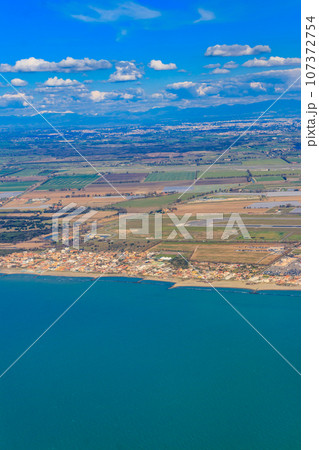 View from a flying plane on Fiumicino bay and the Tyrrhenian sea, Italy 107372754