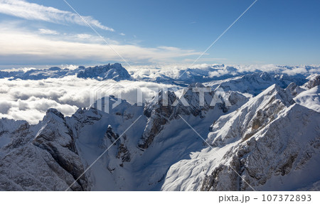 Winter Italy Dolomite mountains covered with snow Winter Italy Dolomite mountains covered with snow 107372893