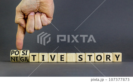 Positive or negative story symbol. Businessman turns cubes, changes concept words Negative story to Positive story. Beautiful grey background. Business positive negative story concept. Copy space. Positive or negative story symbol. Businessman turns cubes, changes concept words Negative story to Positive story. Beautiful grey background. Business positive negative story concept. Copy space. 107377873