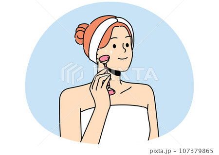 Smiling woman do face roller massage Smiling woman do face roller massage 107379865