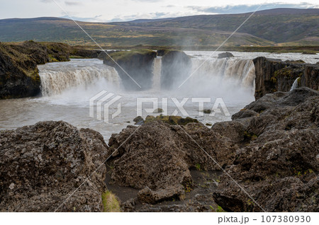 Godafoss Falls and Skjalfandafljot River in northern Iceland under autumn sky. Godafoss Falls and Skjalfandafljot River in northern Iceland under autumn sky. 107380930