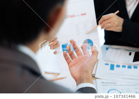analyst team is doing teamwork and brainstorming about new strategy project at the meeting room analyst team is doing teamwork and brainstorming about new strategy project at the meeting room 107381466