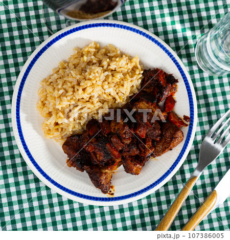 Homemade tasty grilled beef stroganoff with basmati rice Homemade tasty grilled beef stroganoff with basmati rice 107386005