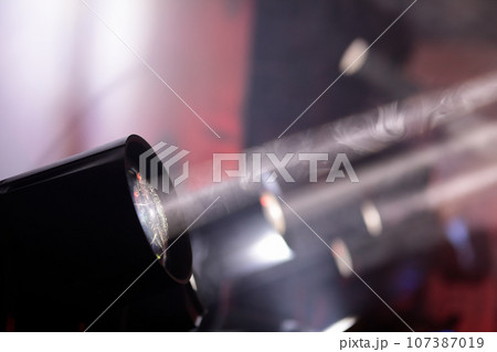 LED stage spotlights with white rays and smoke LED stage spotlights with white rays and smoke 107387019