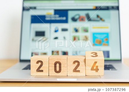 2024 Year block against marketplace website. Goal, Target, Resolution, finance, E commerce, online shopping, celebration and New Year start concepts 2024 Year block against marketplace website. Goal, Target, Resolution, finance, E commerce, online shopping, celebration and New Year start concepts 107387296