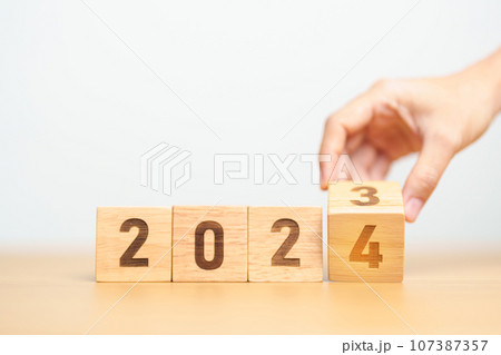 2023 change to 2024 year block on table. goal, Resolution, strategy, plan, start, budget, mission, action, motivation and New Year concepts 107387357