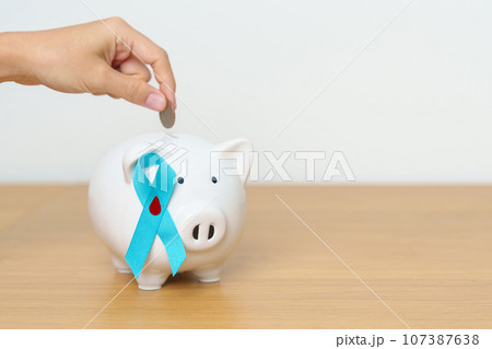 Blue November Diabetes and Prostate Cancer Awareness month, Blue Ribbon with Piggy Bank for support illness life. Health, Donation, Charity, Campaign, Money Saving, Fund, International men, Father day Blue November Diabetes and Prostate Cancer Awareness month, Blue Ribbon with Piggy Bank for support illness life. Health, Donation, Charity, Campaign, Money Saving, Fund, International men, Father day 107387638