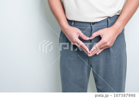 Older Man having Prostate gland or Urinary bladder pain. Prostate Cancer, Enlarged prostate, Prostatitis disease, Hypothyroidism, Male Infertility, Health and World cancer day concept 107387998