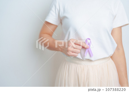 Woman having stomach and abdomen pain with Purple Ribbon for Stomach cancer Awareness month, Digestive system, disease, health and World cancer day concept Woman having stomach and abdomen pain with Purple Ribbon for Stomach cancer Awareness month, Digestive system, disease, health and World cancer day concept 107388220