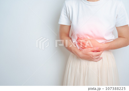 Woman having abdomen pain. Stomach, Ovarian and Cervical cancer, Cervix disorder, Endometriosis, Hysterectomy, Uterine fibroids, Reproductive, menstruation, diarrhea, digestive system and Pregnancy 107388225