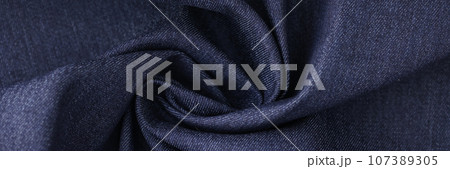 Dark blue dense fabric for suits sewing upper view Dark blue dense fabric for suits sewing upper view 107389305