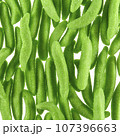 Texture of randomly scattered gelatin candies made in the form of green pea pods sprinkled with sugar. 107396663