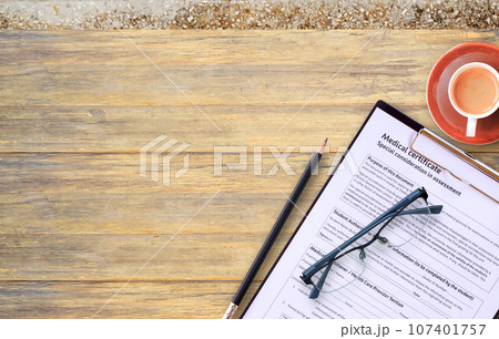Workplace of a doctor.Medical certificate form Workplace of a doctor.Medical certificate form 107401757