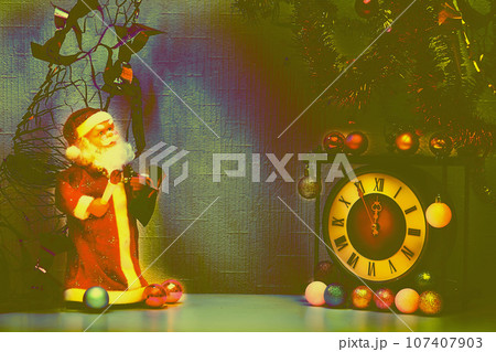 Santa Claus and vintage clock. New Year's Christmas toys,garlands 107407903