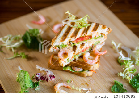 sandwich with lettuce and shrimp. sandwich with lettuce and shrimp. 107410695