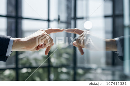 successful businessman touching his finger to the glass Board. 107415321