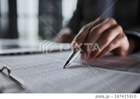 analyzing income charts and graphs. Close up.Business analysis and strategy concept. 107415910