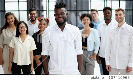 High Angle View Of Multiracial Friend Stacking Hand Together High Angle View Of Multiracial Friend Stacking Hand Together 107416968