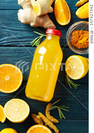 Concept of healthy drink - ginger turmeric liquid Concept of healthy drink - ginger turmeric liquid 107427342