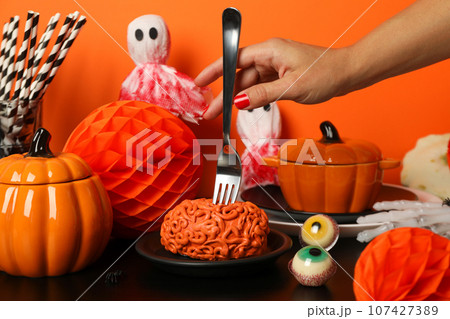 Helloween table setting, a Helloween holiday concept Helloween table setting, a Helloween holiday concept 107427389