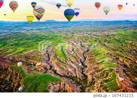 Fly of air balloons in Unique natural place - Cappadocia , Turkiye. Fly of air balloons in Unique natural place - Cappadocia , Turkiye. 107431215