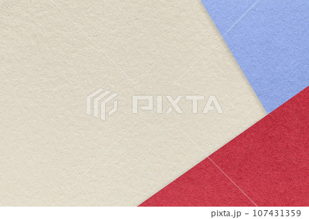 Texture of craft light beige color paper background with blue and red border. Vintage abstract sand cardboard. Texture of craft light beige color paper background with blue and red border. Vintage abstract sand cardboard. 107431359