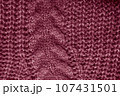 Organic knit background with macro woven threads. 107431501