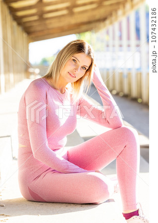 Millennial Blonde Woman Resting in Sports Park Millennial Blonde Woman Resting in Sports Park 107432186