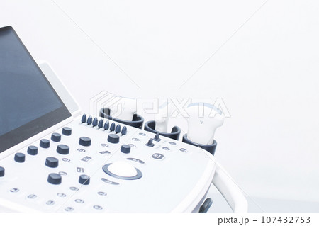 Modern ultrasound machine, scanners and sensors close-up. Medical equipment in the clinic. Modern ultrasound machine, scanners and sensors close-up. Medical equipment in the clinic. 107432753