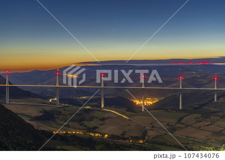 Multi-span cable stayed Millau Viaduct across gorge valley of Tarn River, Aveyron Departement, France Multi-span cable stayed Millau Viaduct across gorge valley of Tarn River, Aveyron Departement, France 107434076