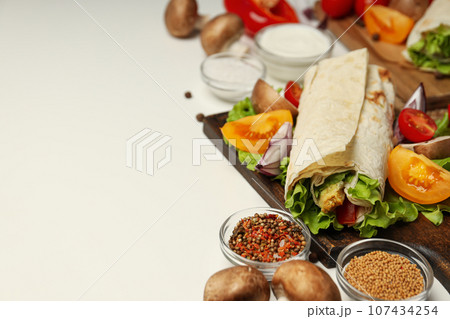 Tasty fast or homemade food concept - delicious shawarma 107434254