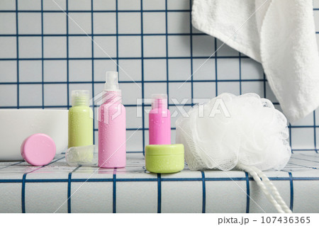 A shelf in the bathroom with care products. A shelf in the bathroom with care products. 107436365