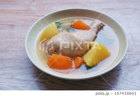 boiled chicken leg with potato and carrot couple onion soup on plate boiled chicken leg with potato and carrot couple onion soup on plate 107438601