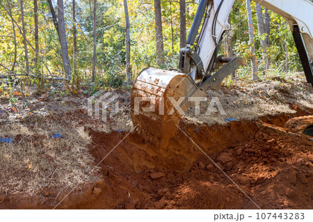 During construction tractor has been used to level ground for residential area of house on build site 107443283
