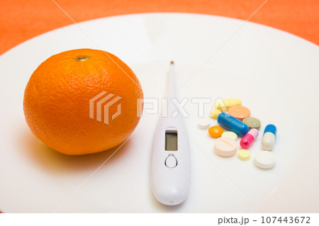 Electronic thermometer with tablets and capsules - protection quarantine, coronavirus, covid19 107443672