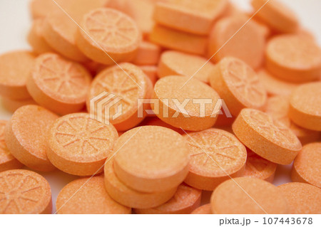Many tablets and orange vitamin - protection during quarantine, coronavirus, covid19 107443678