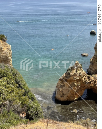 Rocks and sandy beach in Portugal, Lagos 107444770