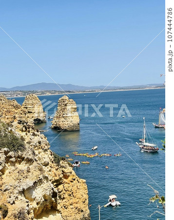 Rocks and sandy beach in Portugal, Lagos Rocks and sandy beach in Portugal, Lagos 107444786