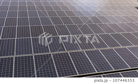 Top View Solar Panels Or Solar Cell above Parking Places Outdoor, Renewable Electrical Energy Production. Green Clean Alternative Power. Photovoltaic Modules. Horizontal Plane 107446353