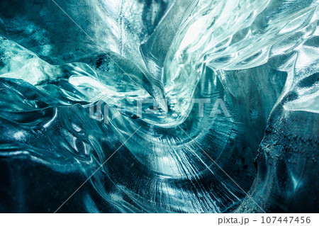 Polar crevasse in vatnajokull ice blocks, icelandic landscape inside massive caves with icy cracked rocks and mass covered in frost. Glacier hiking in iceland scenery, global warming. 107447456