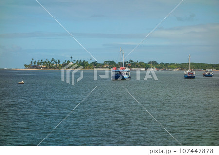 passenger boats anchored in the bay of Porto Seguro, Bahia, Brazil 107447878