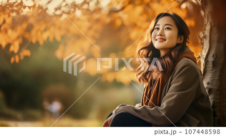 秋の公園で座って紅葉を楽しむ大人の女性のポートレートのイラスト素材 [107448598] - PIXTA