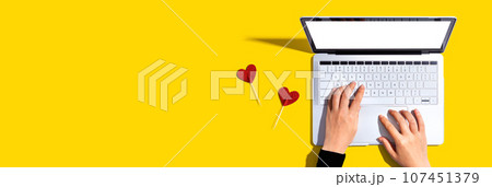 Laptop computer with heart cushions 107451379