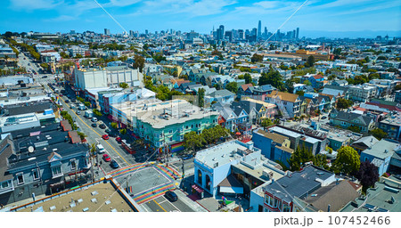 Aerial Castro District rainbow crosswalks with skyscraper view of downtown San Francisco 107452466